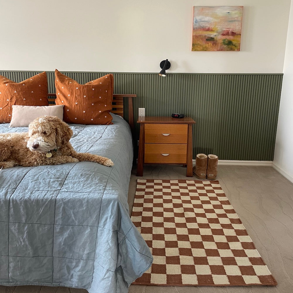 Checkered rug bedside